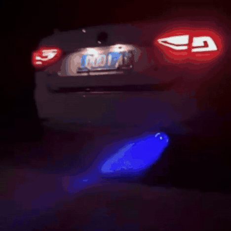 FireTail LED exhaust tip glowing on a car at night